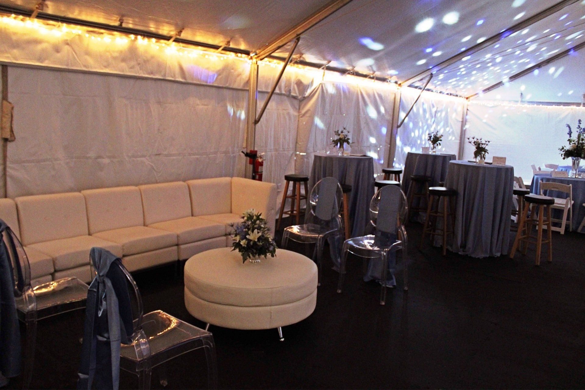 Lounge seating in a tented room