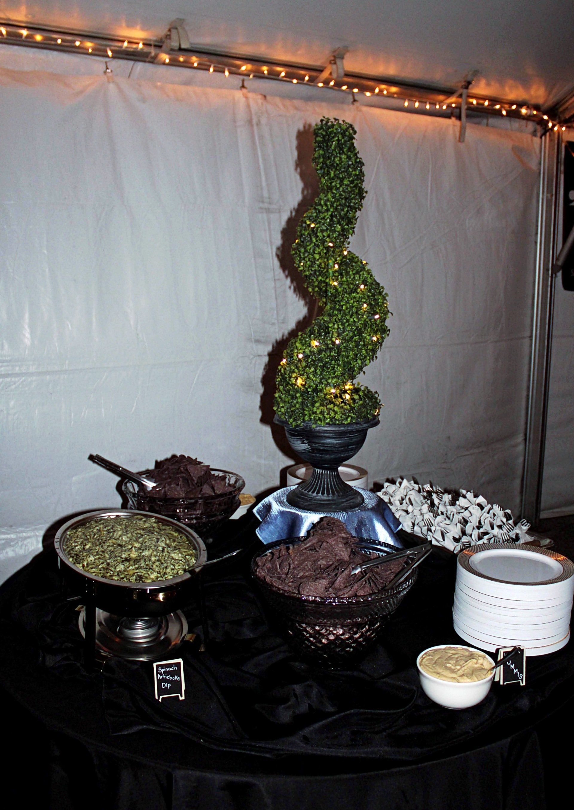 appetizer table with large topiary centerpiece