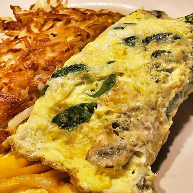 Custom omelette with spinach and mushrooms at Antonia's Pancake House