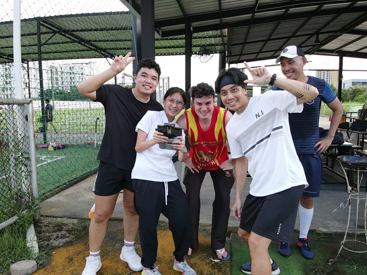 A group of people are posing for a picture together.