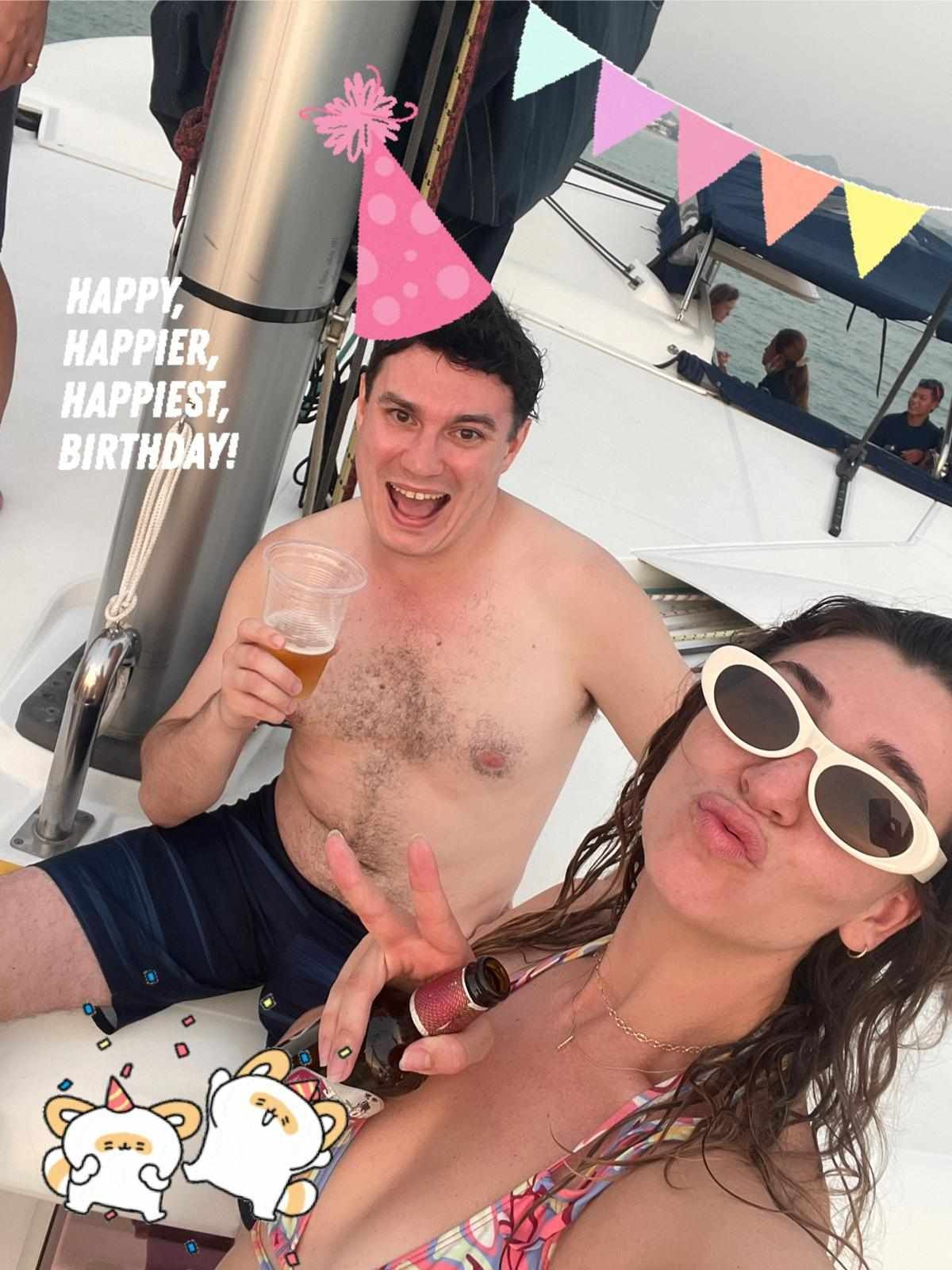 A man and a woman are celebrating their birthday on a boat.