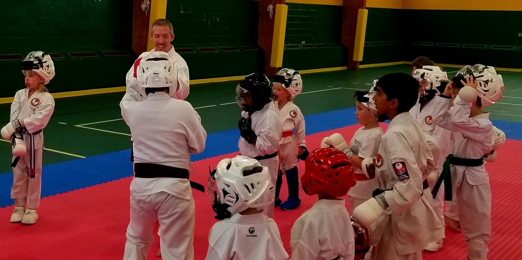 An aerial view of a city skyline at sunset.