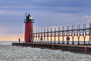 Evening skies begin to clear after a stormy afternoon at the South Haven, Michigan Lighthouse on Lake Michigan.