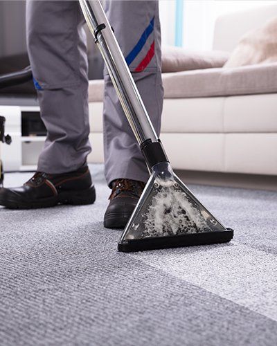 Worker Cleaning the Carpet | Finksburg, MD | Handyman On Call LLC