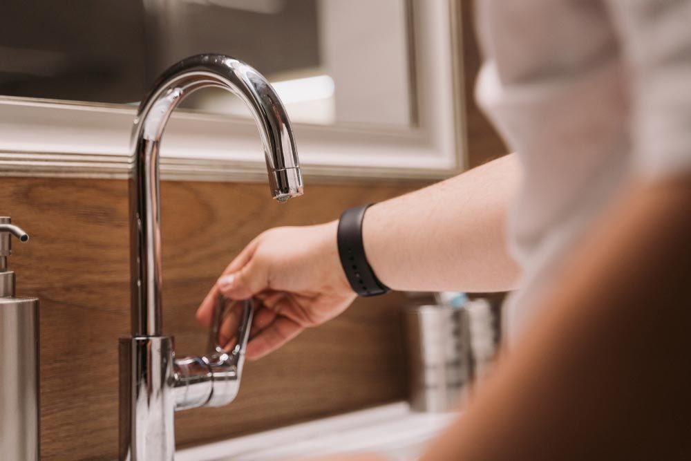 Holding a faucet handle