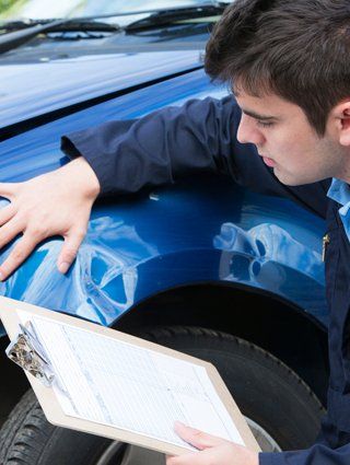 Mechanic Inspecting Damage Car — New Braunfels, TX — Assurance Specialist of Texas