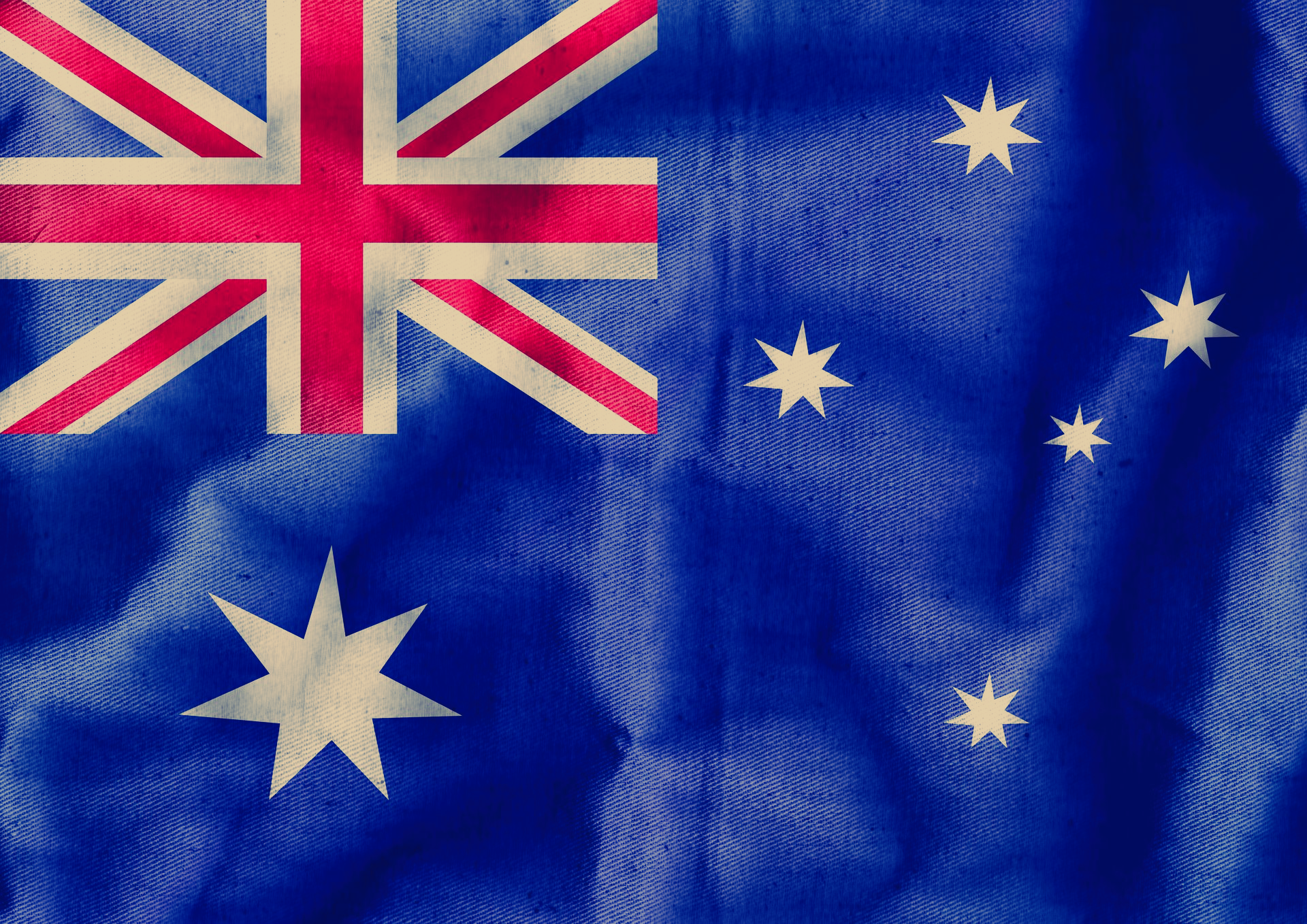 Australian flag: Blue background with the Union Jack in the upper left and the Southern Cross constellation on the right.