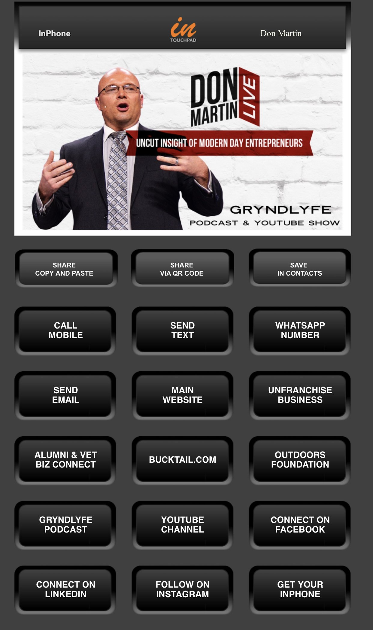 A phone screen shows a man in a suit and tie