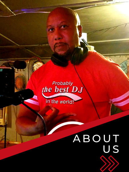 DJ in red shirt and headphones behind a booth, with “ABOUT US” text in the corner