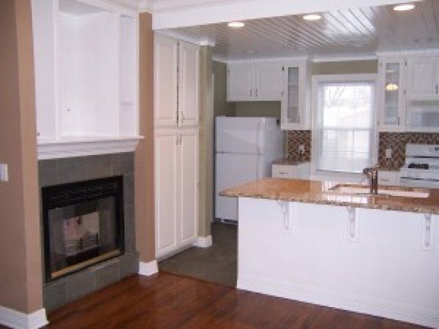 Kitchen with fireplace in 308 S 49 St | DiBar Enterprises