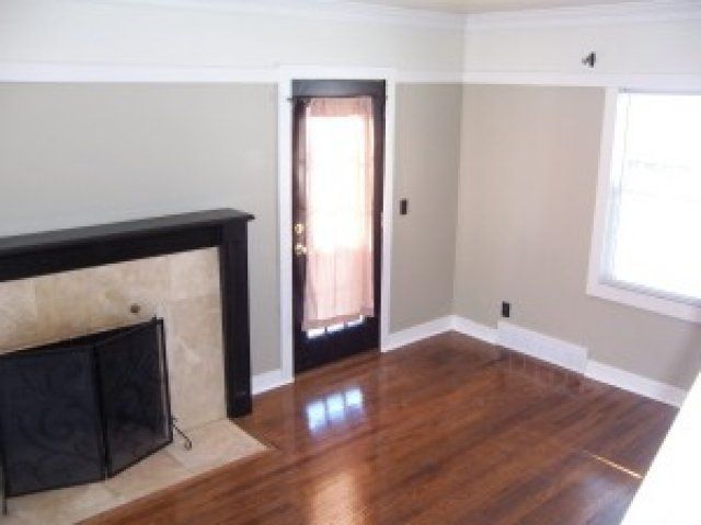 Living area with fireplace in 308 S 49 St | DiBar Enterprises