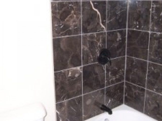 Tiled shower of 308 S 49 St | DiBar Enterprises