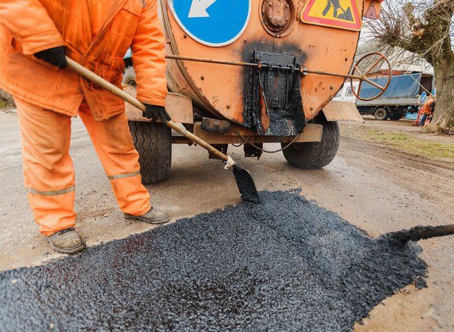 pothole patching on a side road