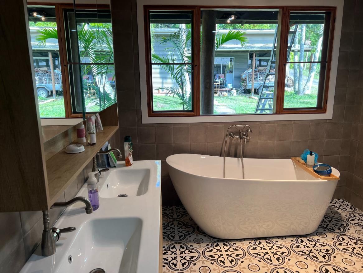 A Bathroom With Two Sinks And A Bathtub — Etosha Plumbing & Gasfitting In Alstonville, NSW