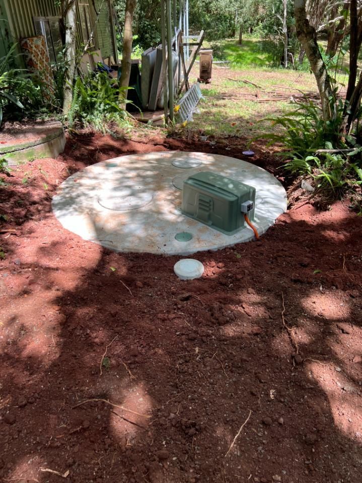 A Concrete Circle In The Middle Of A Dirt Field — Etosha Plumbing & Gasfitting In Alstonville, NSW