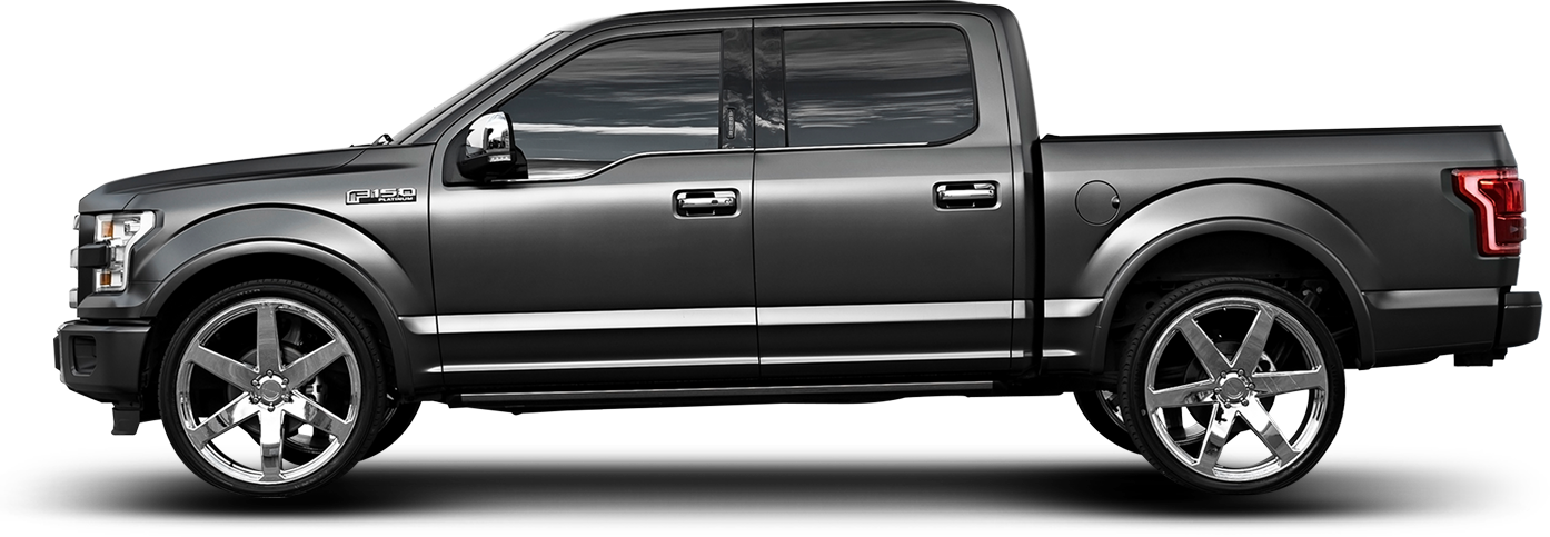 Grey pickup truck with black wheels.