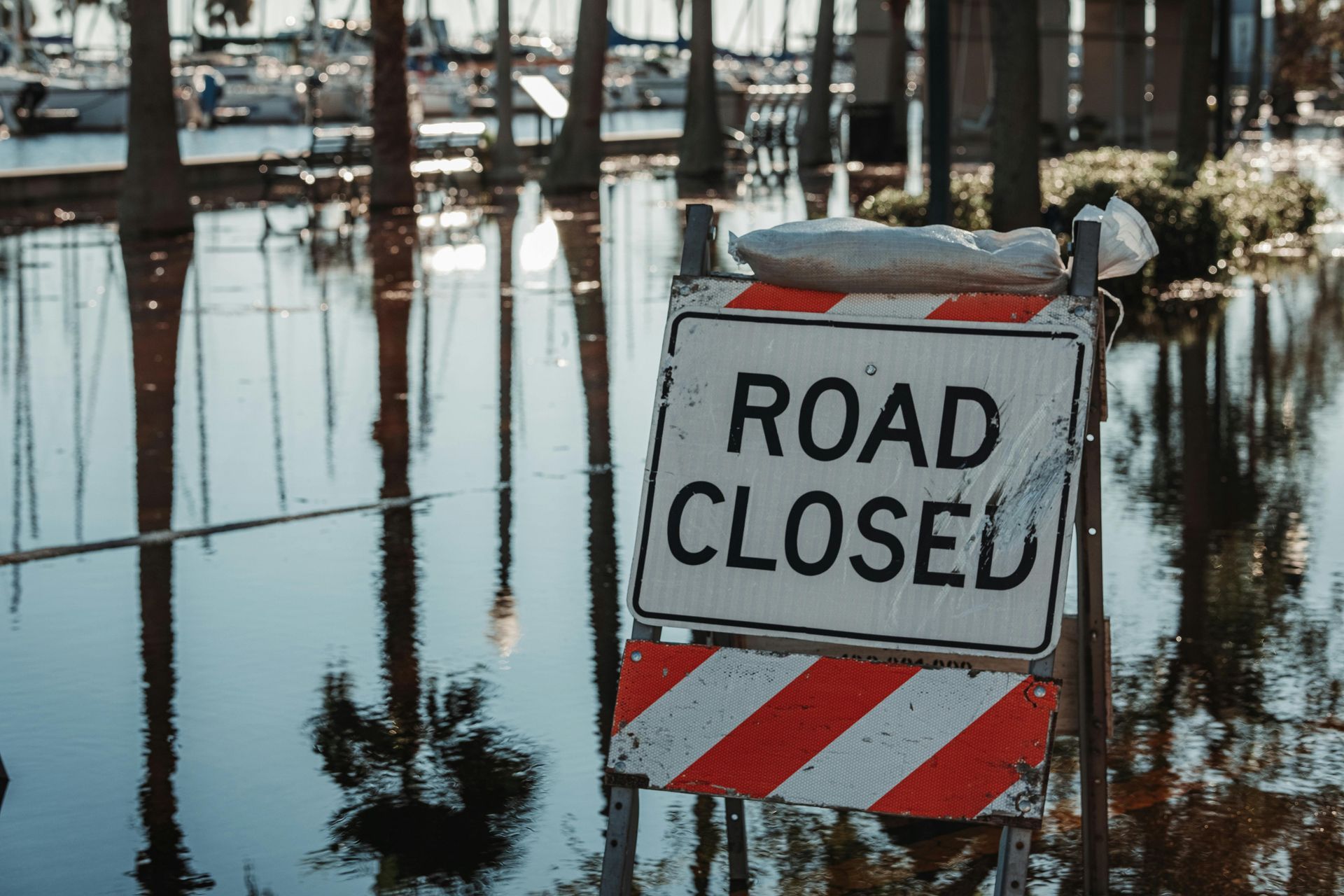 flooded roads. roof damage from after severe weather daytona beach