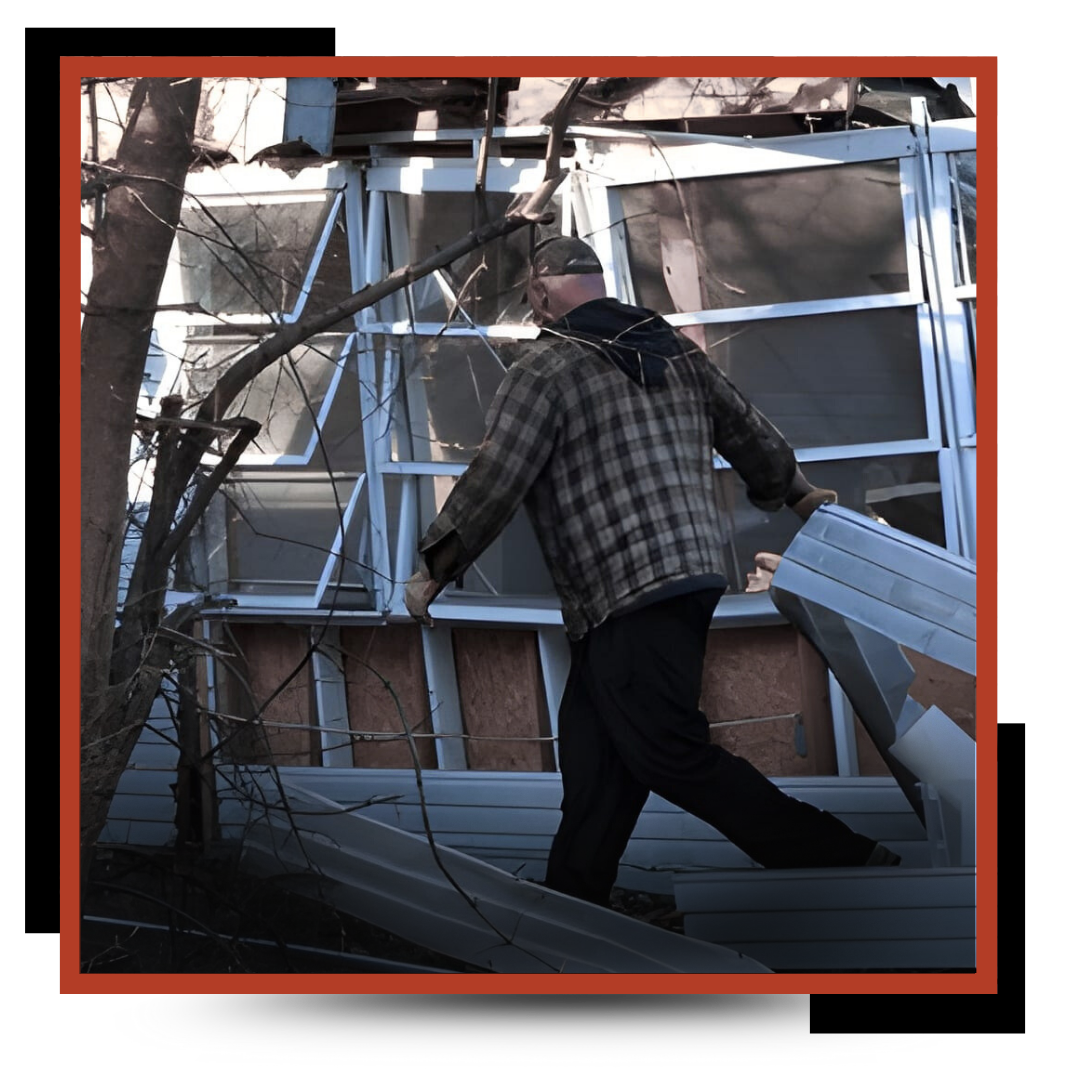 a garbage man piling the junk