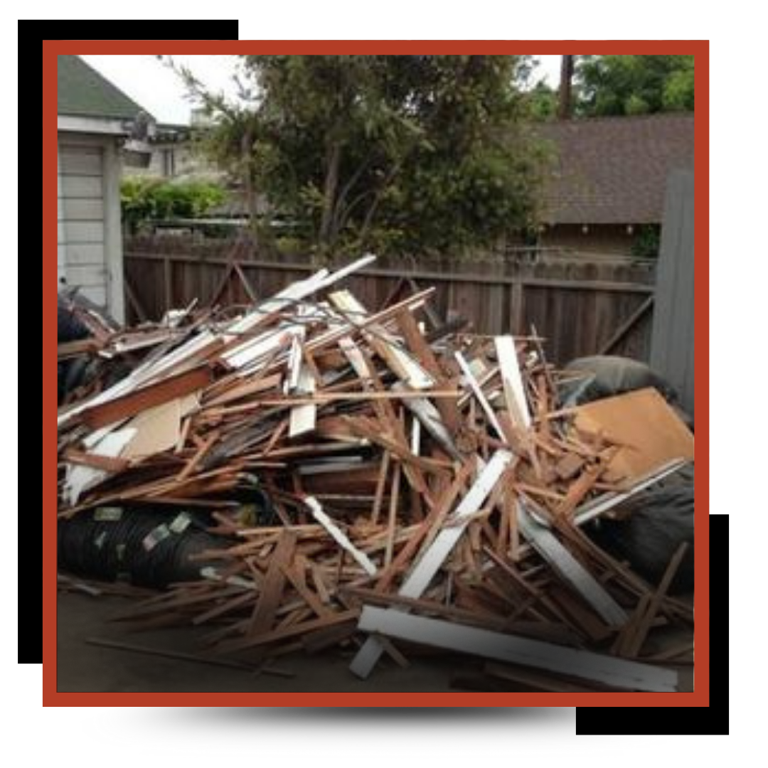 JP Junk Removal & Hauling Dump Truck in front of a house