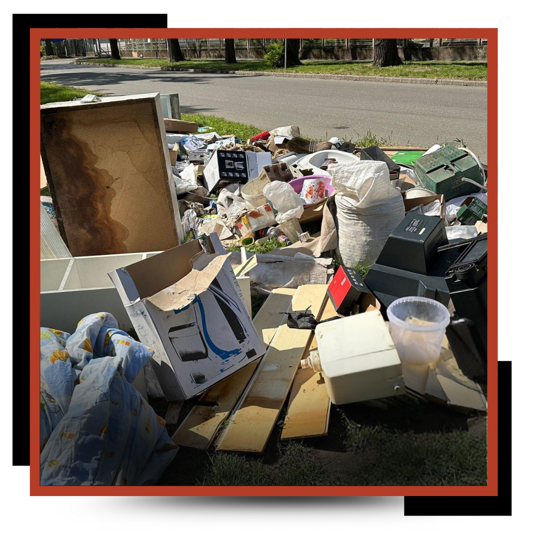 JP Junk Removal & Hauling Dump Truck in front of a house