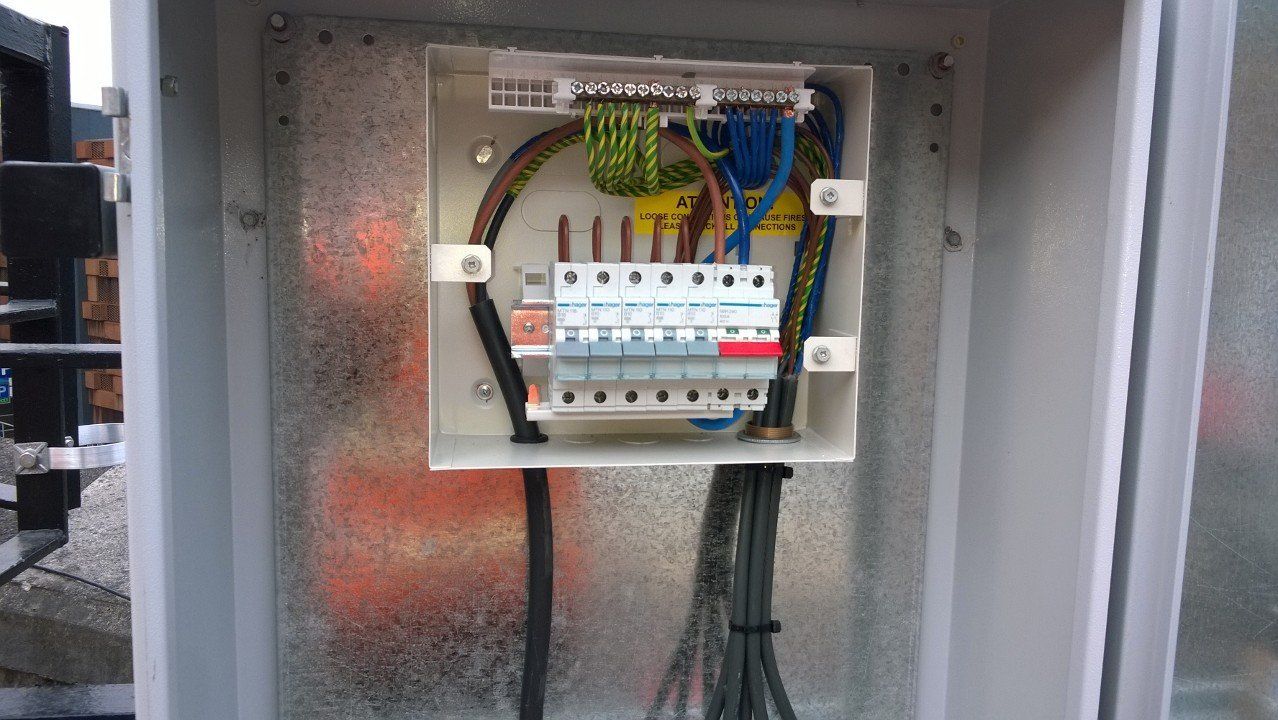 Photo of a consumer unit in an external enclosure