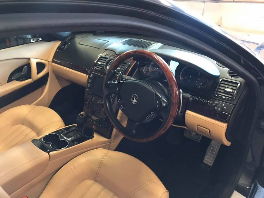 The Interior of Car With Tan Seats — Adettra in Tuncurry, NSW