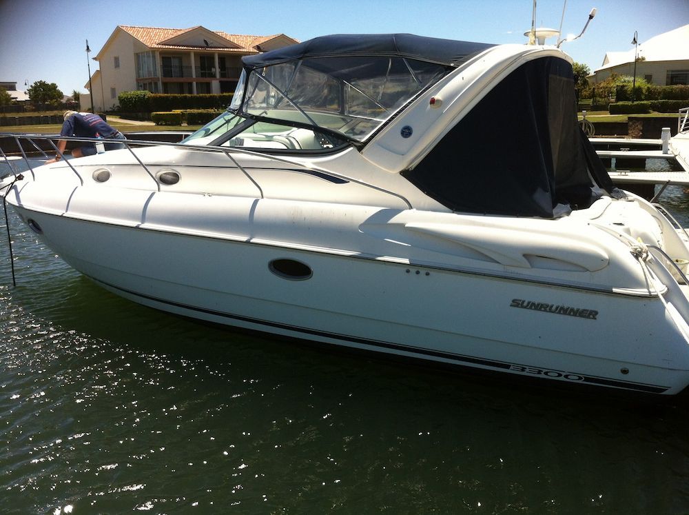 A White Boat is Docked in the Water — Adettra in Forster, NSW