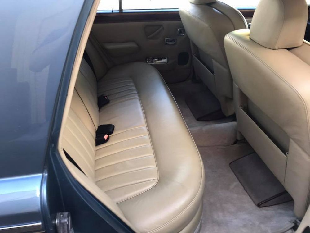 The Back Seat of a Car With Tan Leather Seats — Adettra in Tuncurry, NSW