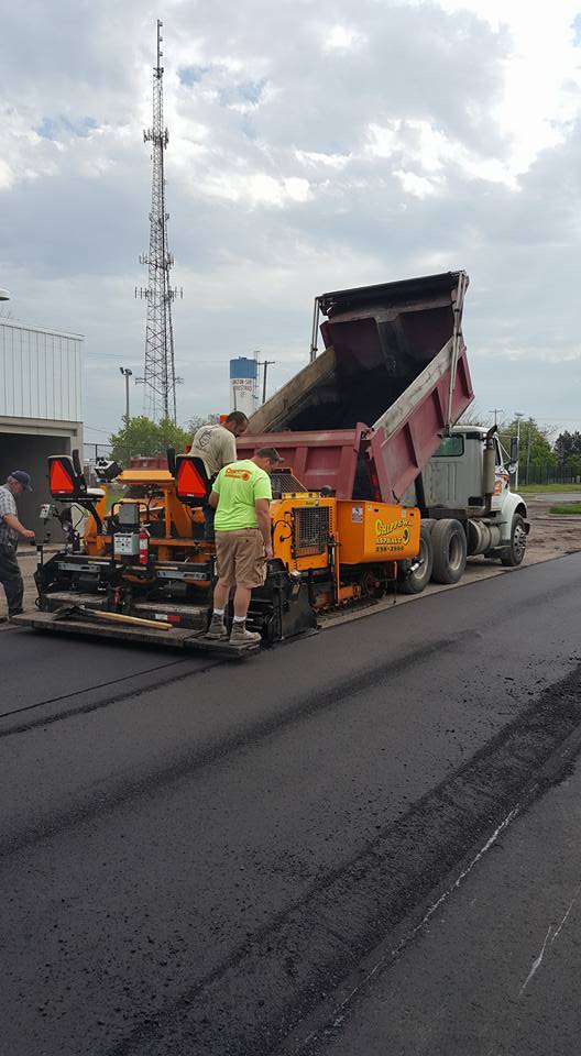 Back Picture Of Big Truck With Three Workers - Clio, MI - Chippewa Asphalt Paving