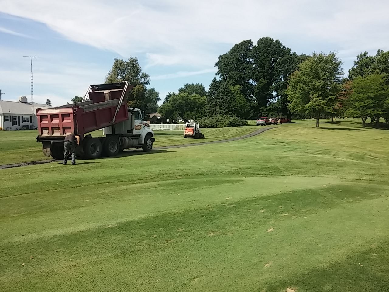 Man Shoveling Cement - Clio, MI - Chippewa Asphalt Paving