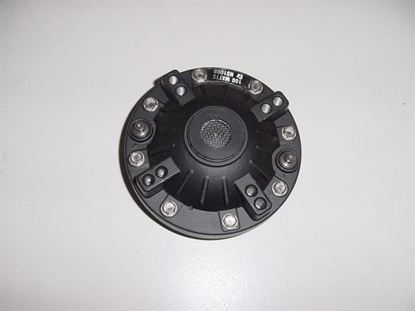 A close up of a black object on a white surface