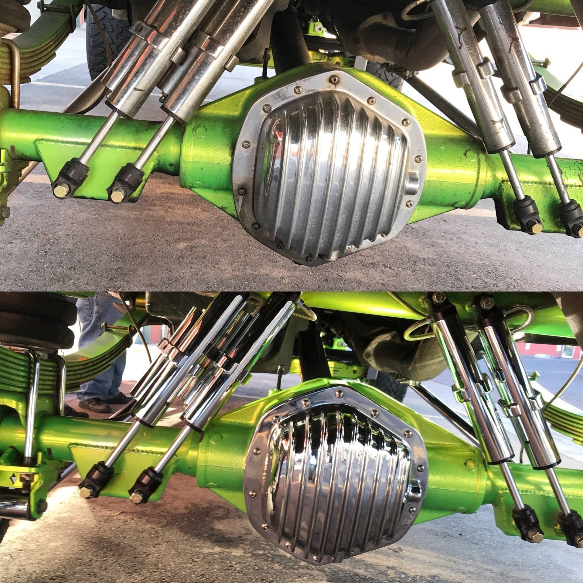 a green truck with a chrome differential cover on it