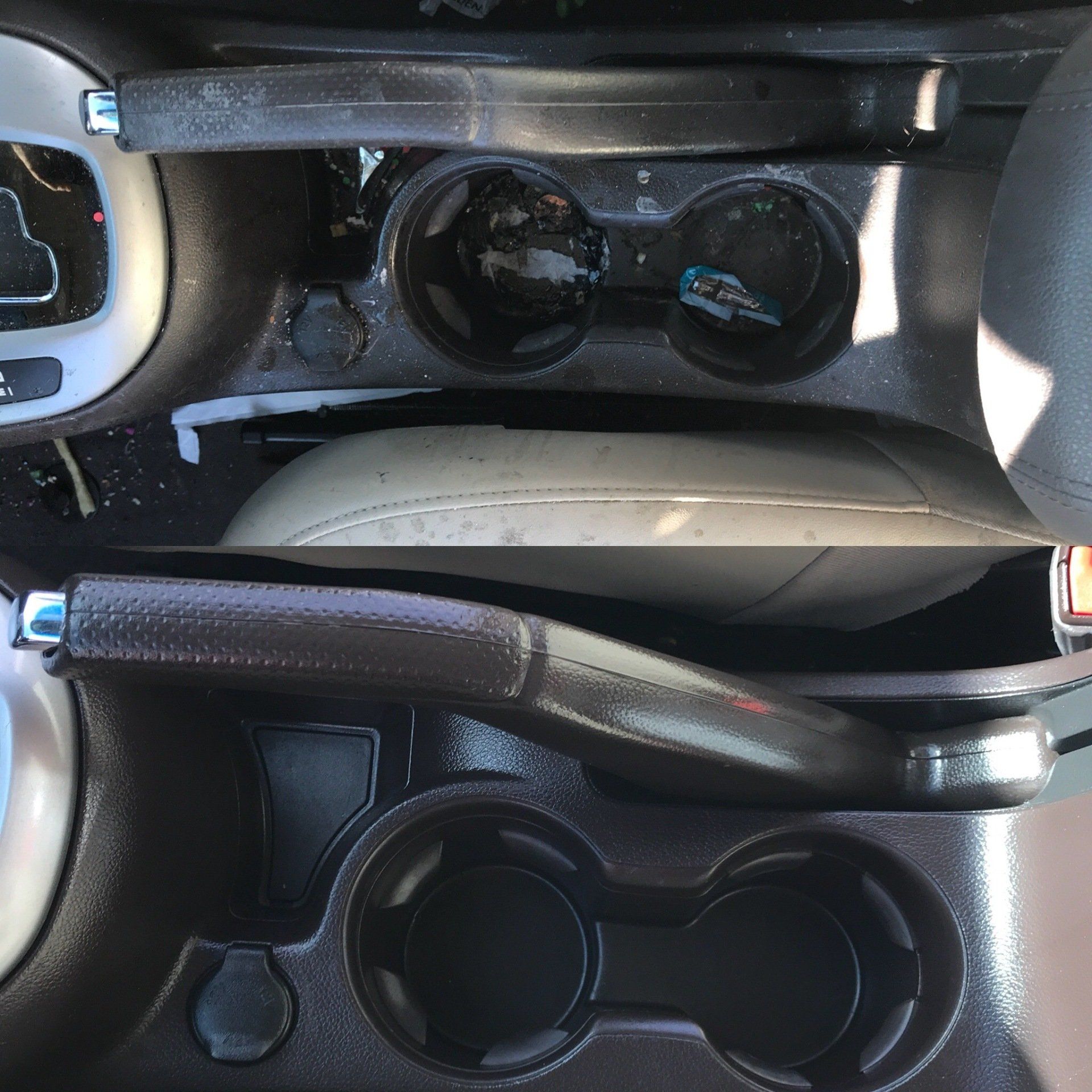 a car with a cup holder and a steering wheel