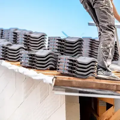 Roof installation with tiles ready by HRS Restoration Services in Denver Colorado