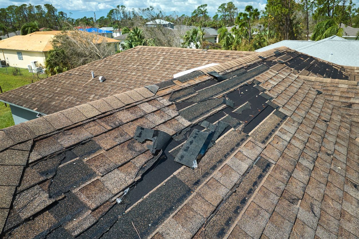 home with a storm damaged roof