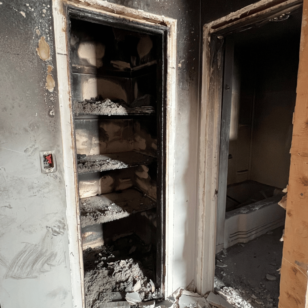 Smoke-damaged interior space in a Colorado Springs property, showing soot removal needs and fire restoration preparation after a structural fire.
