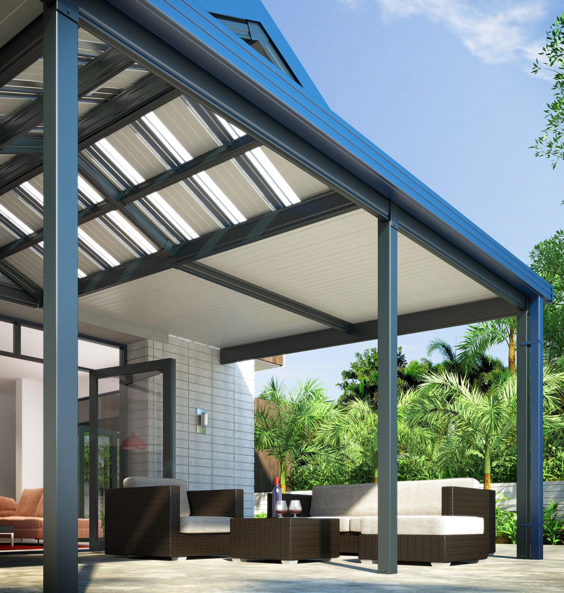 A Patio With a Blue Roof and Wicker Furniture — ShedPro Constructions in Taree, NSW