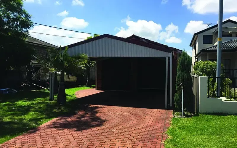 A Small Shed in A Yard — ShedPro Constructions in Darawank, NSW