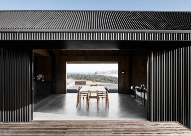 There is a Table and Chairs in the Middle of the Room — ShedPro Constructions in Kempsey, NSW