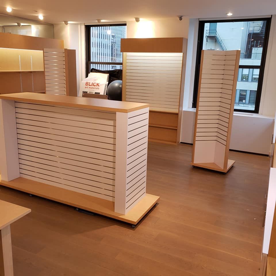 an empty store with a sign that says blick on it