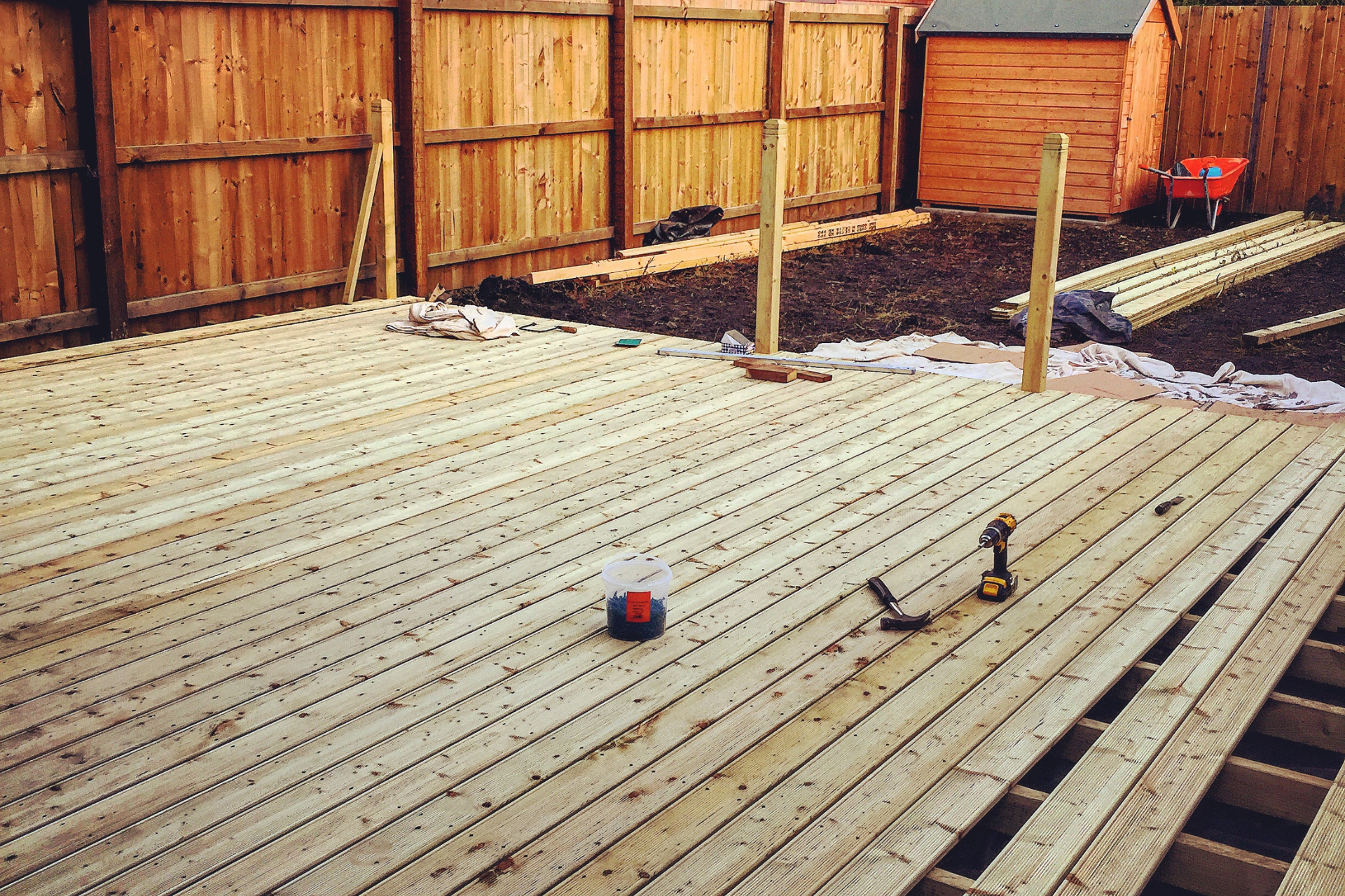 A photo of a deck being built by Desert Dream Decks. The deck is almost complete.