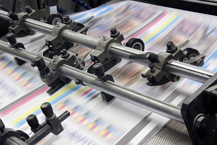 Working Printing Machine — Aurora, IL — Wally’s Printing