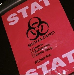 A red sign that says biohazard on it