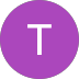 A purple circle with a white letter t inside of it.