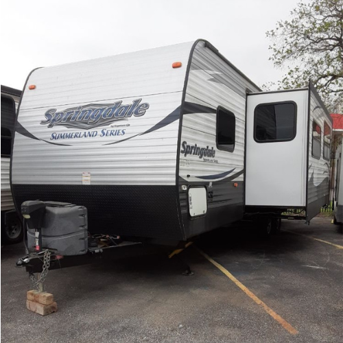 A spritedale trailer is parked in a parking lot