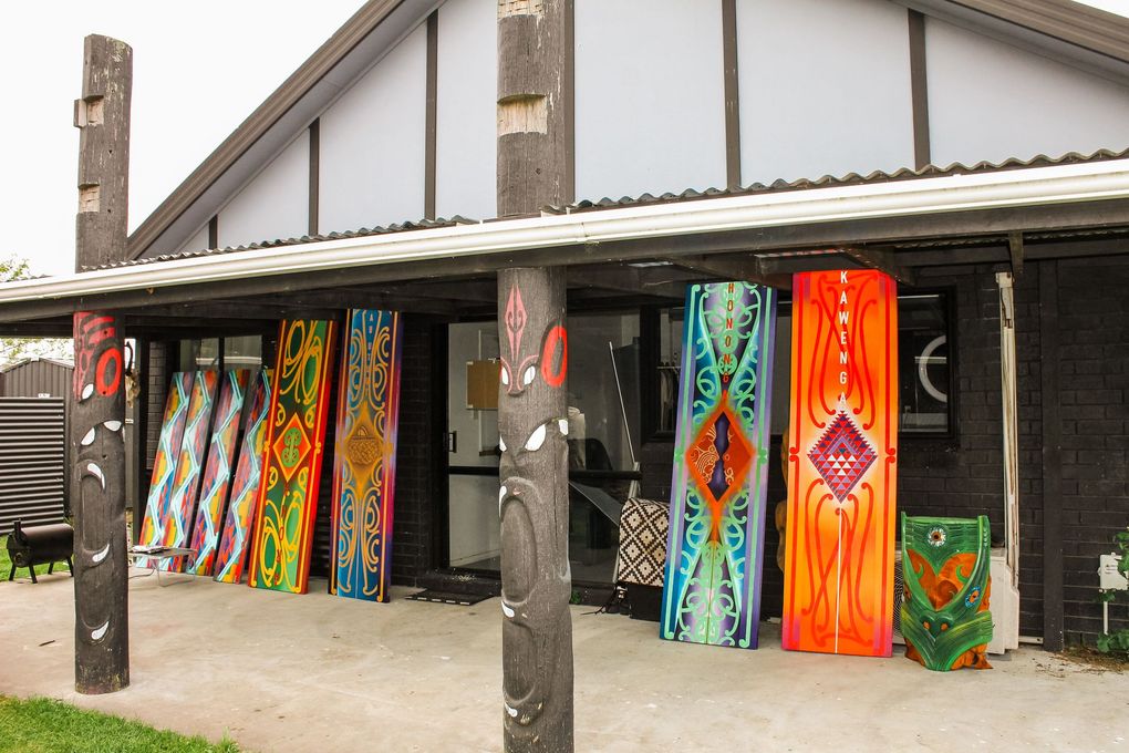 A building with a lot of colorful doors on it