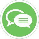 A green circle with two white speech bubbles in it.