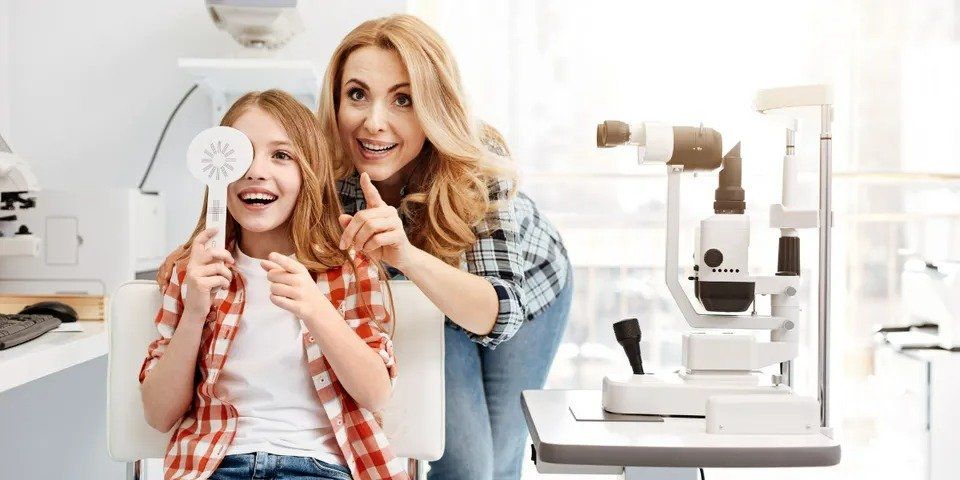 A lady with her children — New London, WI — Griebenow Eyecare Sc Clintonville