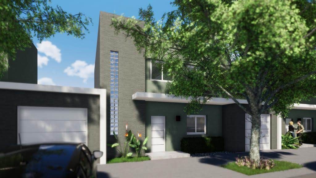 Casa moderna de dos plantas con exterior gris, garaje y un árbol al frente. Día soleado y luminoso.