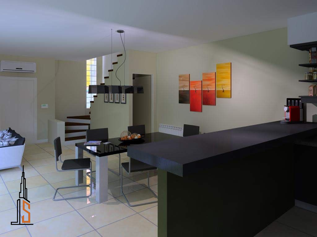 Comedor moderno con mesa y sillas, isla de cocina y obras de arte en la pared.